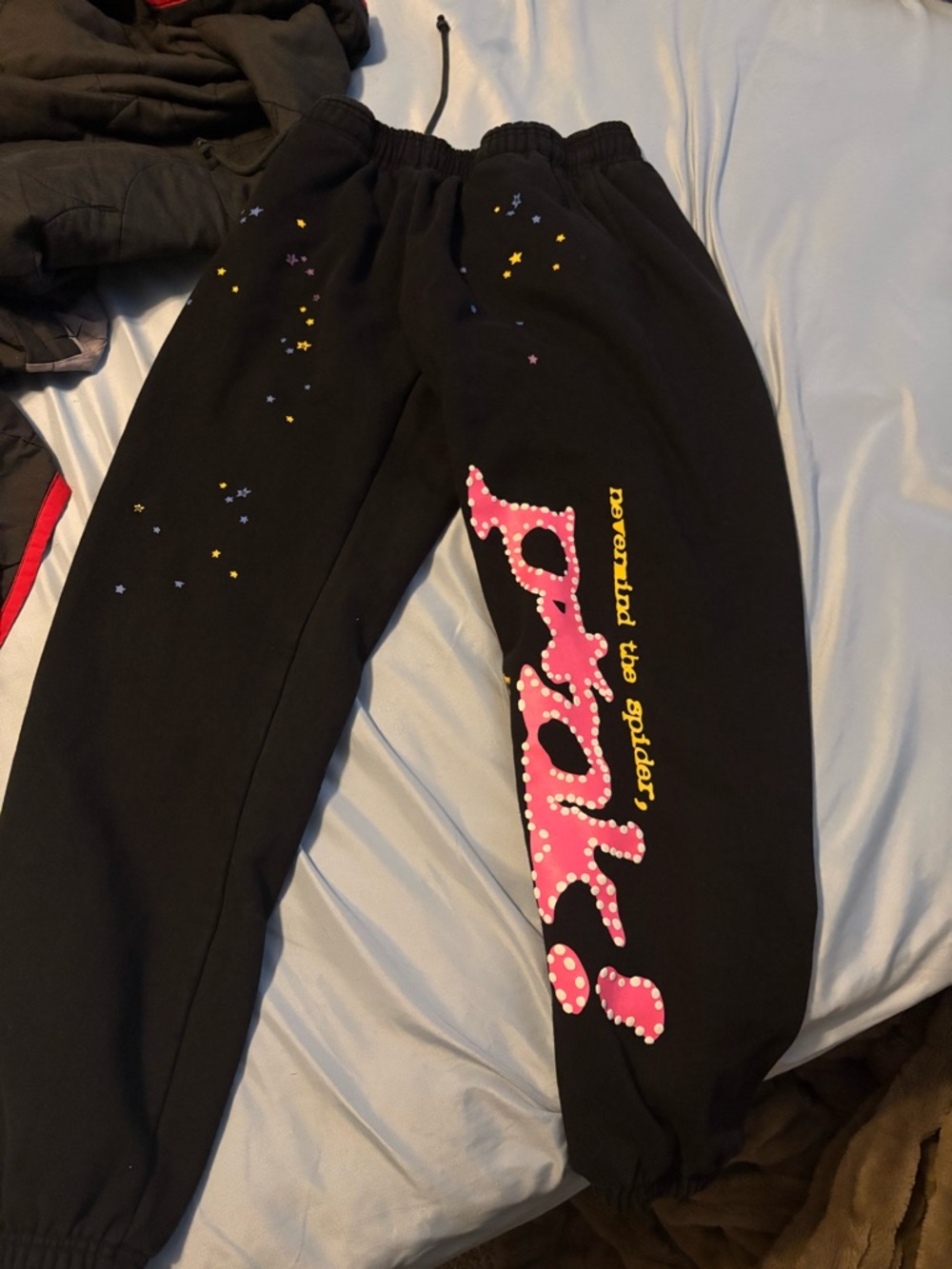 Black Sweatpants with Pink Polka-Dot Script and Star Accents